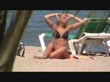 Candid blond girl on beach